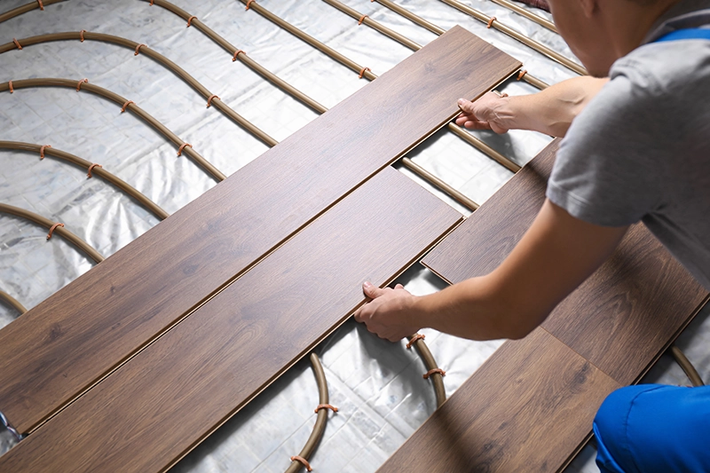 Laying floor over radient heat install